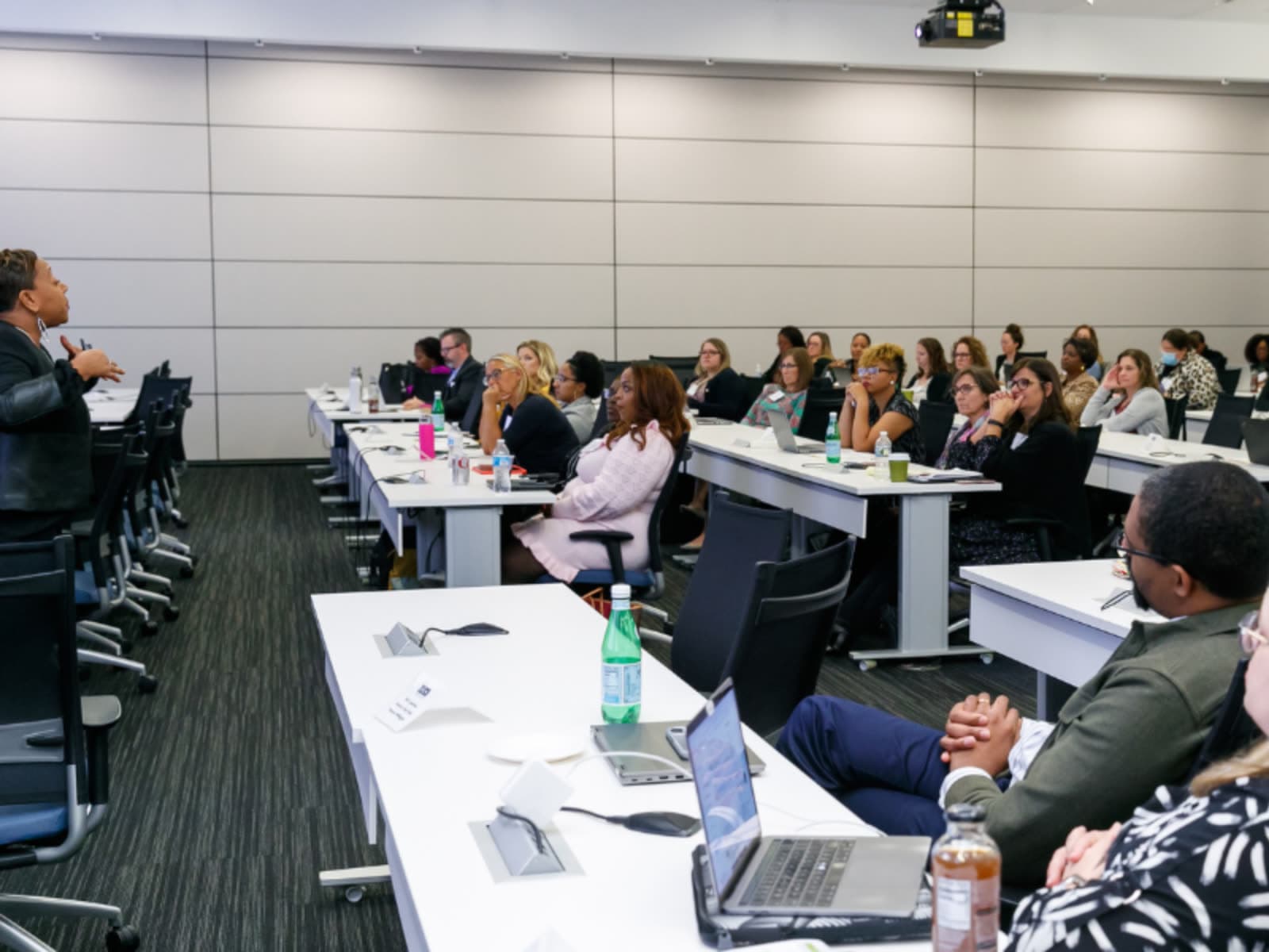 Kelly Charles-Collins, Esq. leading a corporate training session
